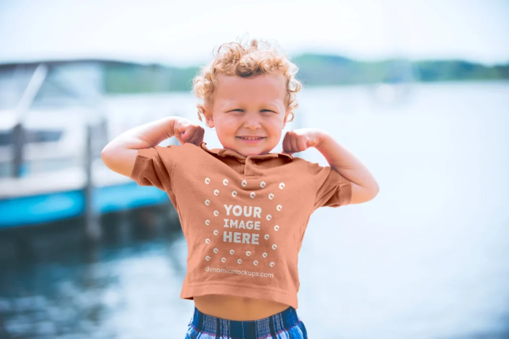 Boy Wearing Peach T-shirt Mockup Front View Template