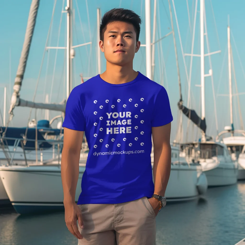 Man Wearing Blue T-shirt Mockup Front View Template