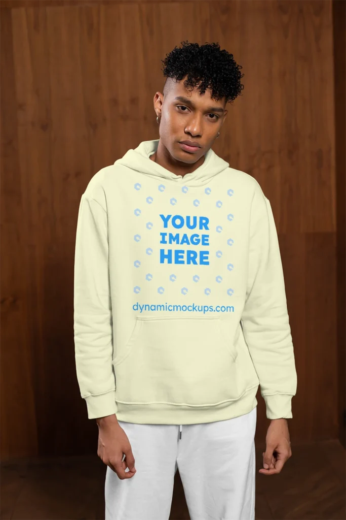 Man Wearing Cream Hoodie Mockup Front View Template