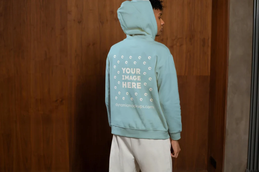 Man Wearing Light Blue Hoodie Mockup Back View Template