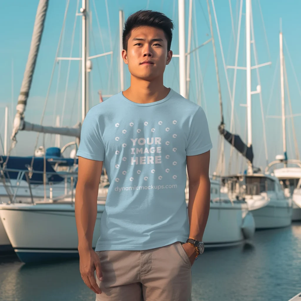 Man Wearing Light Blue T-shirt Mockup Front View Template