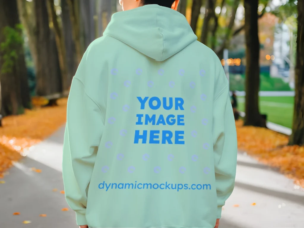 Man Wearing Mint Hoodie Mockup Back View Template