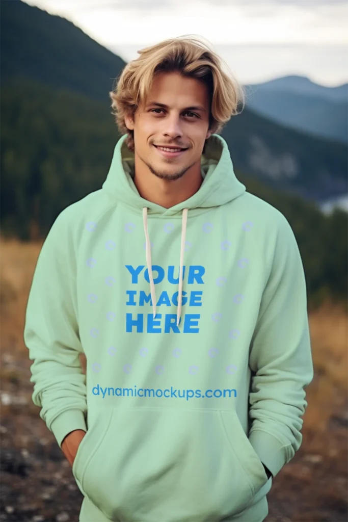 Man Wearing Mint Hoodie Mockup Front View Template