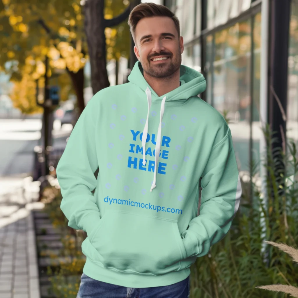 Man Wearing Mint Hoodie Mockup Front View Template