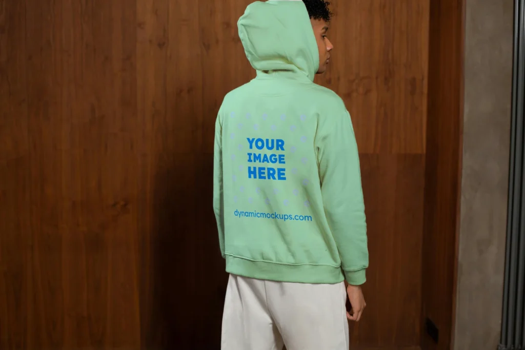 Man Wearing Mint Hoodie Mockup Back View Template