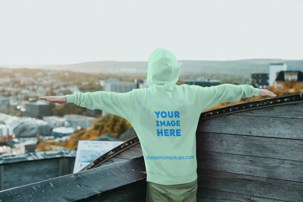 Man Wearing Mint Hoodie Mockup Back View Template