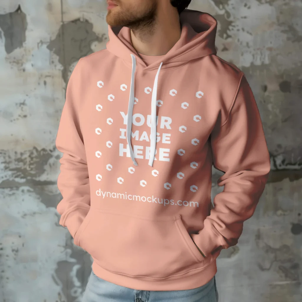 Man Wearing Peach Hoodie Mockup Front View Template