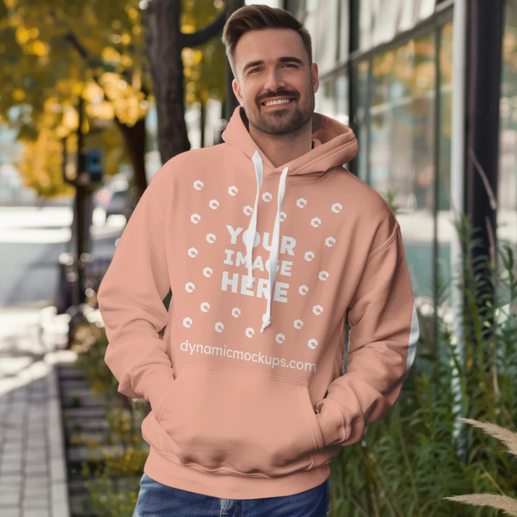 Man Wearing Peach Hoodie Mockup Front View Template