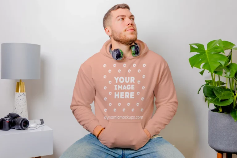 Man Wearing Peach Hoodie Mockup Front View Template