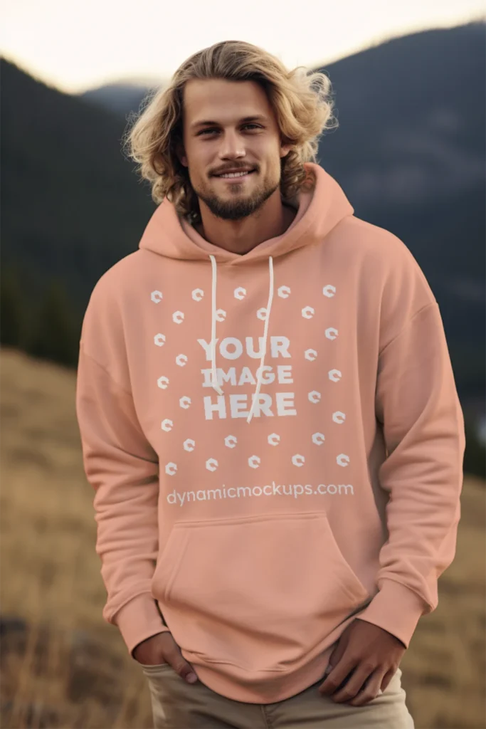 Man Wearing Peach Hoodie Mockup Front View Template