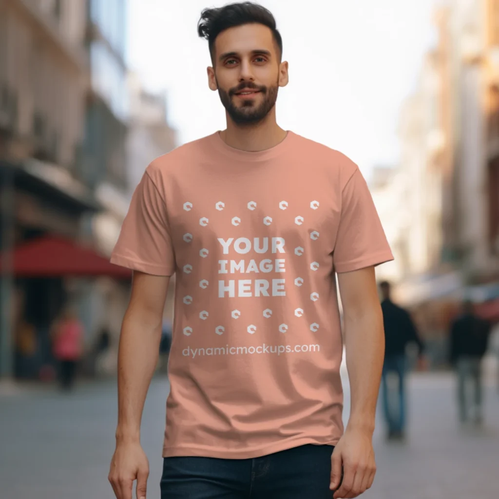 Man Wearing Peach T-shirt Mockup Front View Template