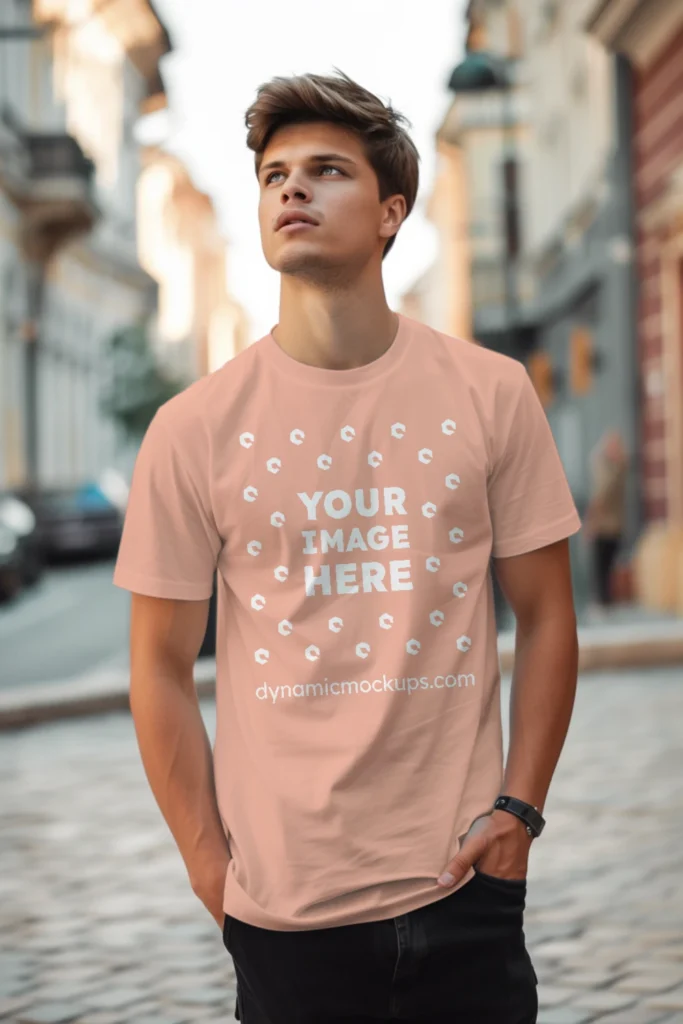 Man Wearing Peach T-shirt Mockup Front View Template