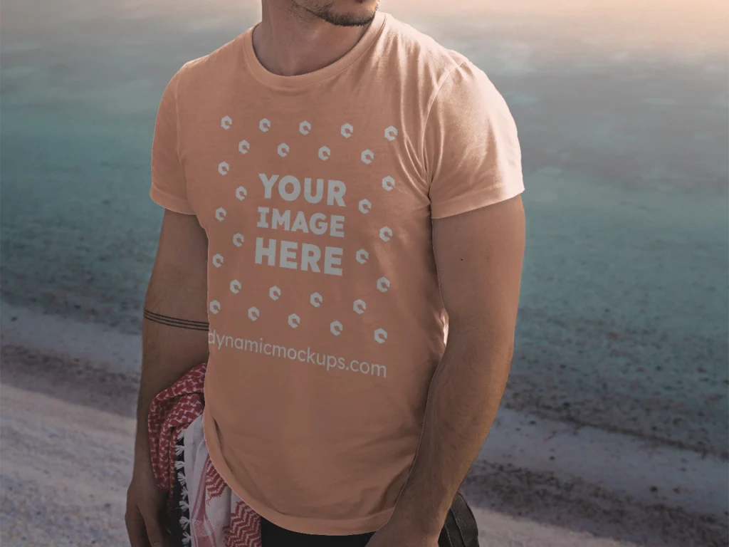 Man Wearing Peach T-shirt Mockup Front View Template