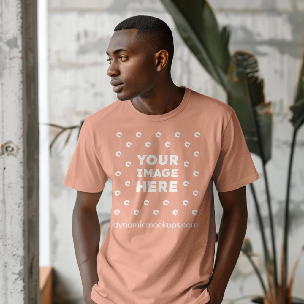 Man Wearing Peach T-shirt Mockup Front View Template