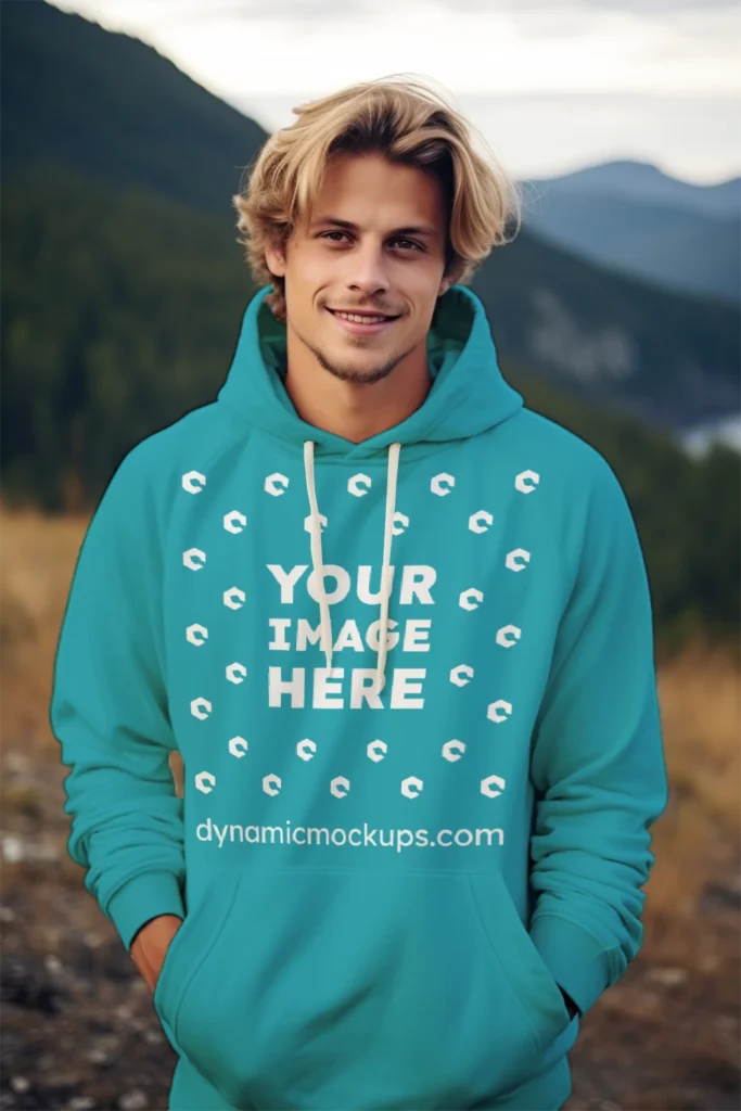 Man Wearing Teal Hoodie Mockup Front View Template