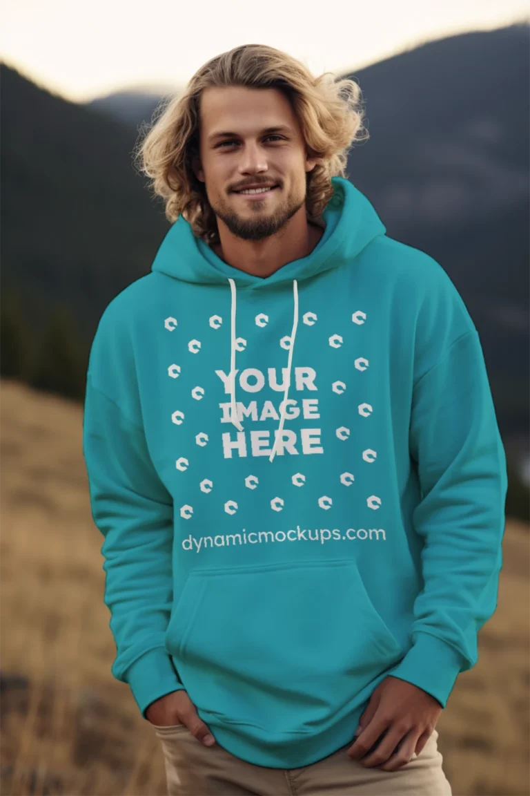 Man Wearing Teal Hoodie Mockup Front View Template