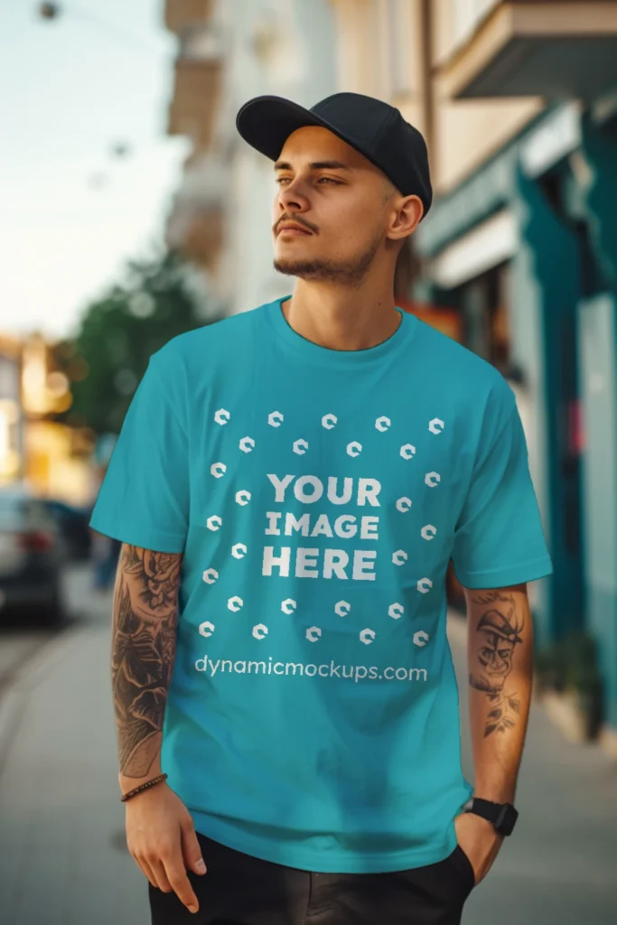 Man Wearing Teal T-shirt Mockup Front View Template