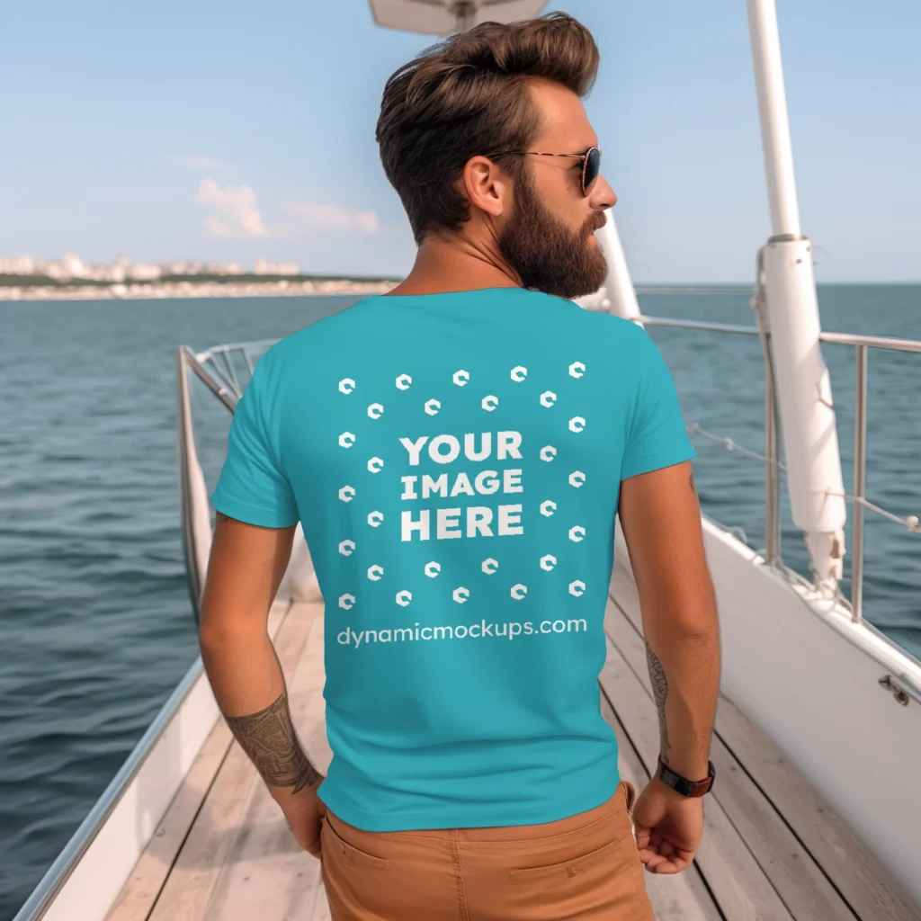 Man Wearing Teal T-shirt Mockup Back View Template