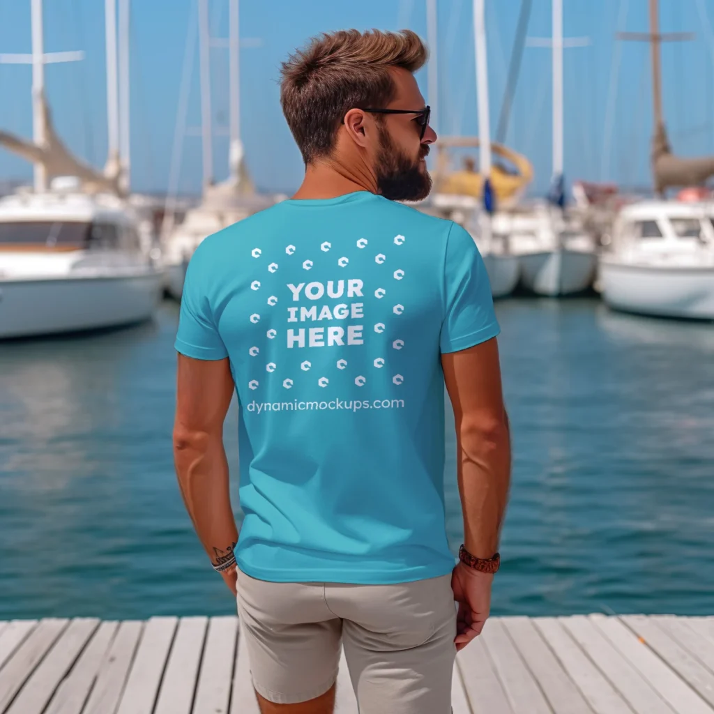 Man Wearing Teal T-shirt Mockup Back View Template