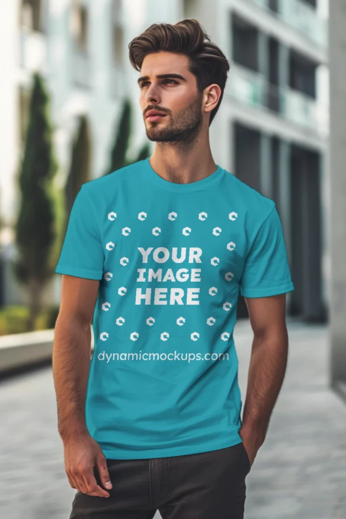 Man Wearing Teal T-shirt Mockup Front View Template