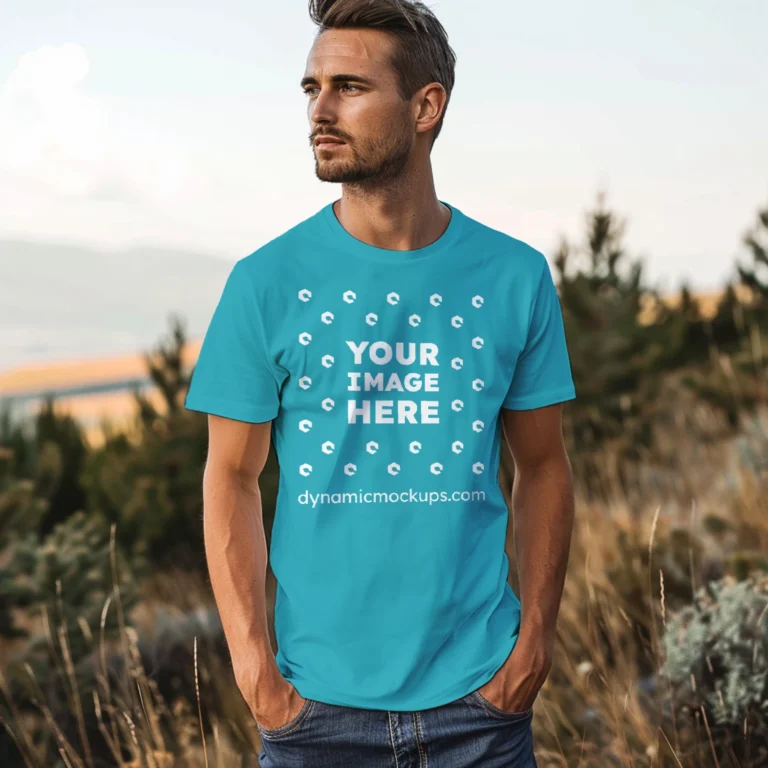 Man Wearing Teal T-shirt Mockup Front View Template