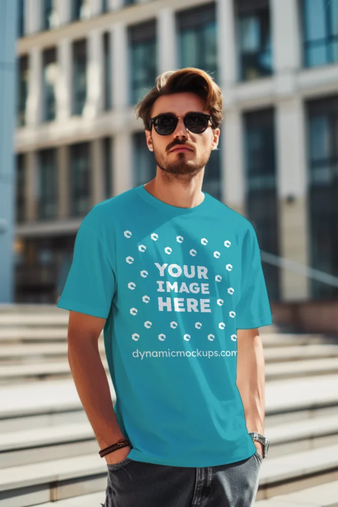 Man Wearing Teal T-shirt Mockup Front View Template