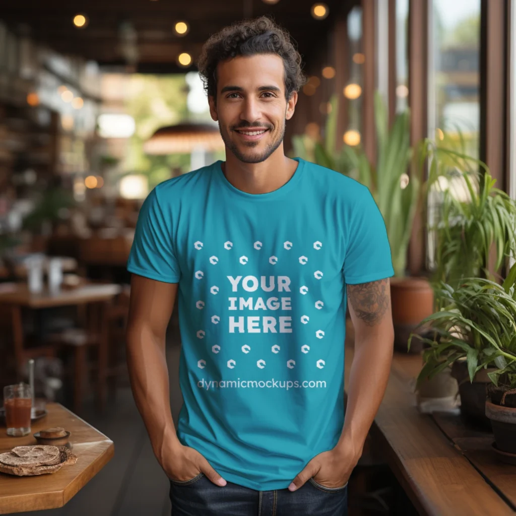 Man Wearing Teal T-shirt Mockup Front View Template