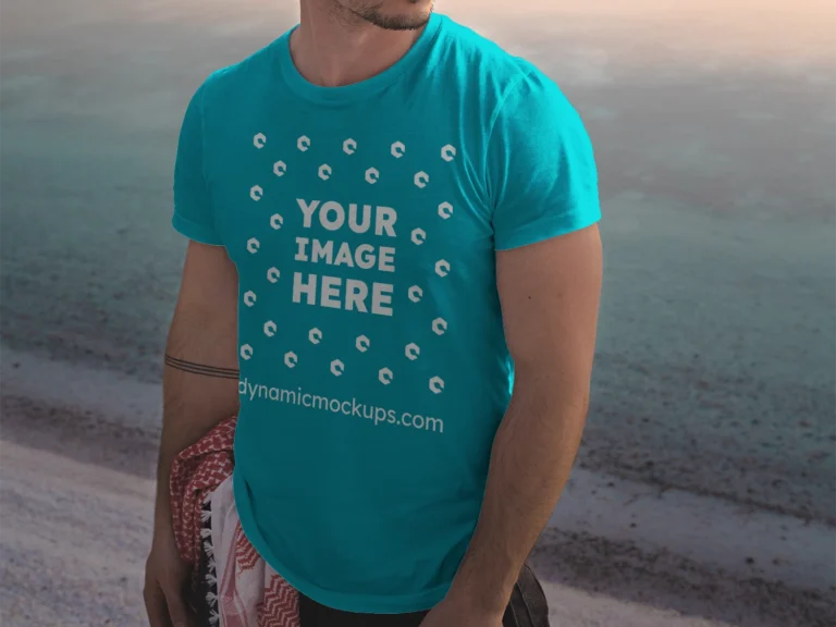 Man Wearing Teal T-shirt Mockup Front View Template