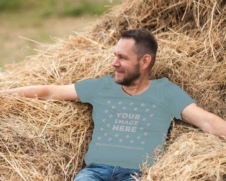 Man Wearing Teal T-shirt Mockup Front View Template