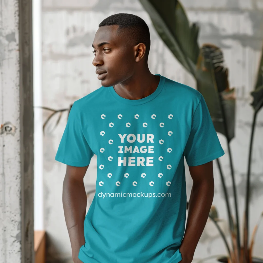 Man Wearing Teal T-shirt Mockup Front View Template