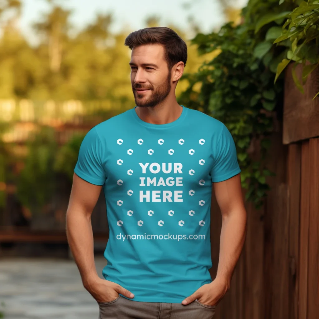 Man Wearing Teal T-shirt Mockup Front View Template