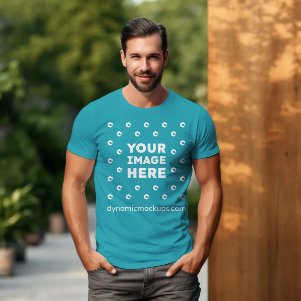 Man Wearing Teal T-shirt Mockup Front View Template