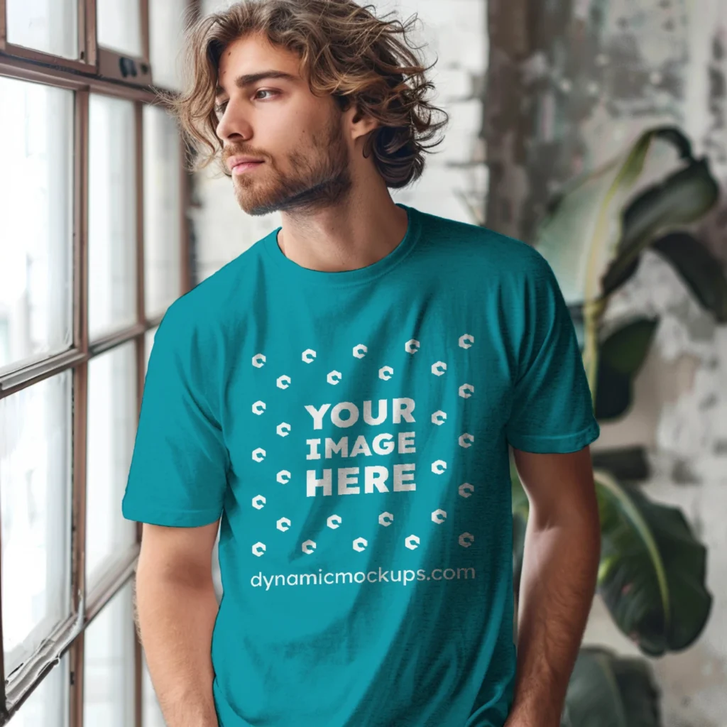 Man Wearing Teal T-shirt Mockup Front View Template