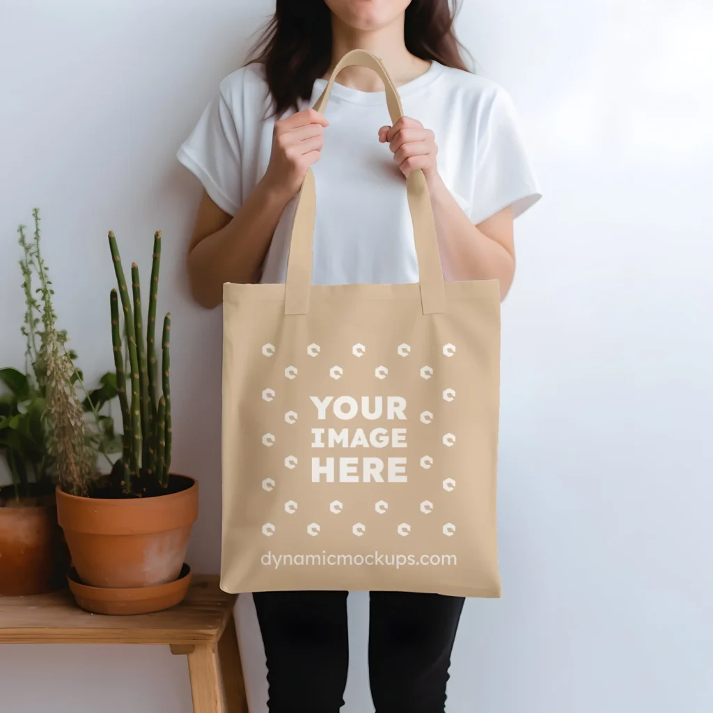 Woman Holding Beige Tote Bag Mockup Front View Template