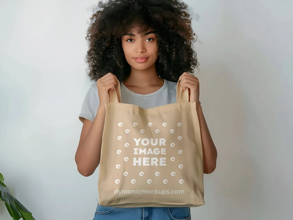 Woman Holding Beige Tote Bag Mockup Front View Template