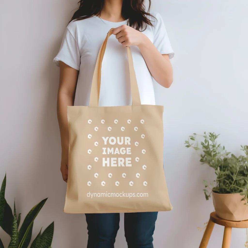 Woman Holding Beige Tote Bag Mockup Front View Template