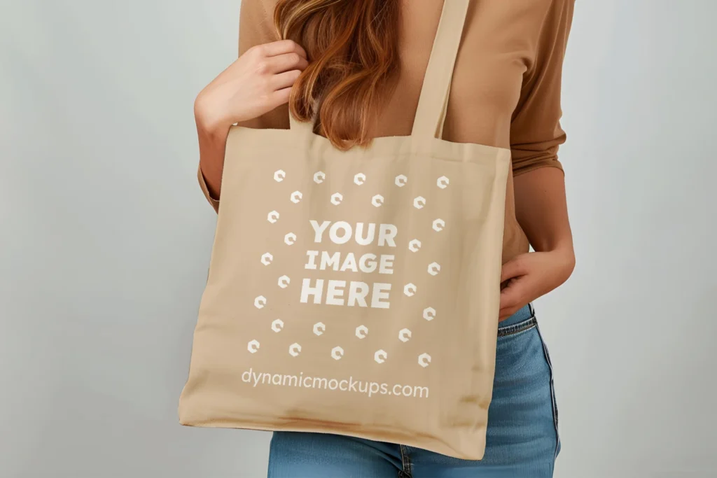 Woman Holding Beige Tote Bag Mockup Front View Template