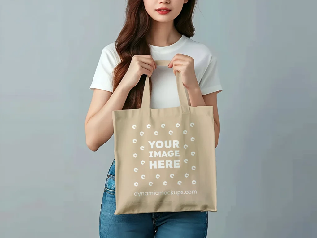 Woman Holding Beige Tote Bag Mockup Front View Template