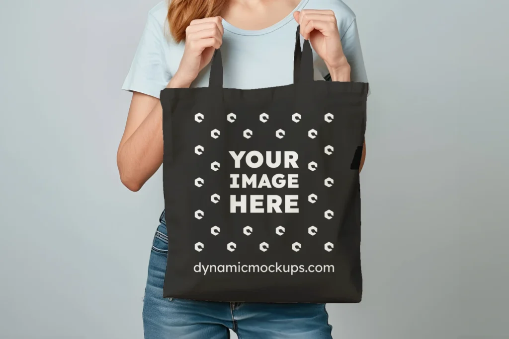 Woman Holding Black Tote Bag Mockup Front View Template