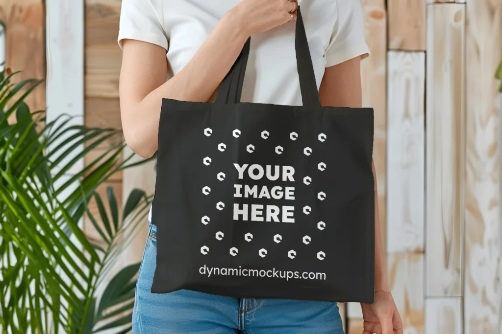 Woman Holding Black Tote Bag Mockup Front View Template