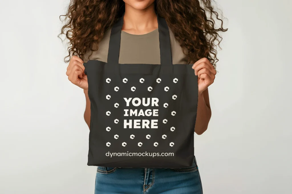 Woman Holding Black Tote Bag Mockup Front View Template