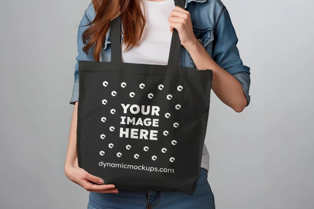 Woman Holding Black Tote Bag Mockup Front View Template