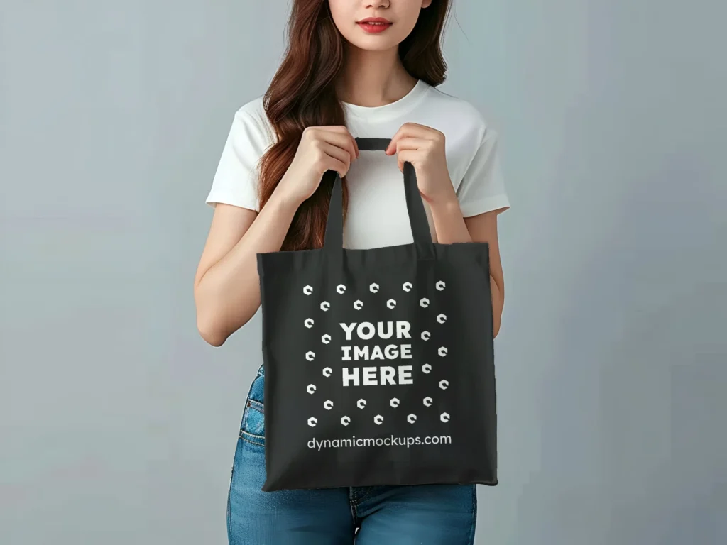 Woman Holding Black Tote Bag Mockup Front View Template