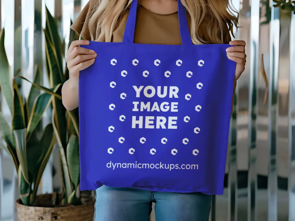 Woman Holding Blue Tote Bag Mockup Front View Template