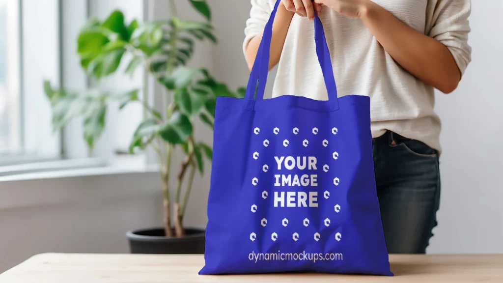 Woman Holding Blue Tote Bag Mockup Front View Template