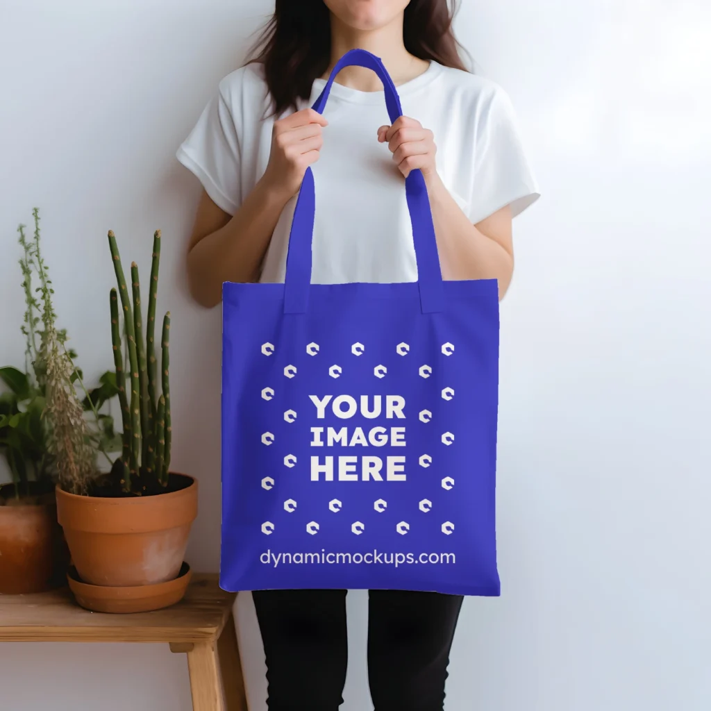 Woman Holding Blue Tote Bag Mockup Front View Template