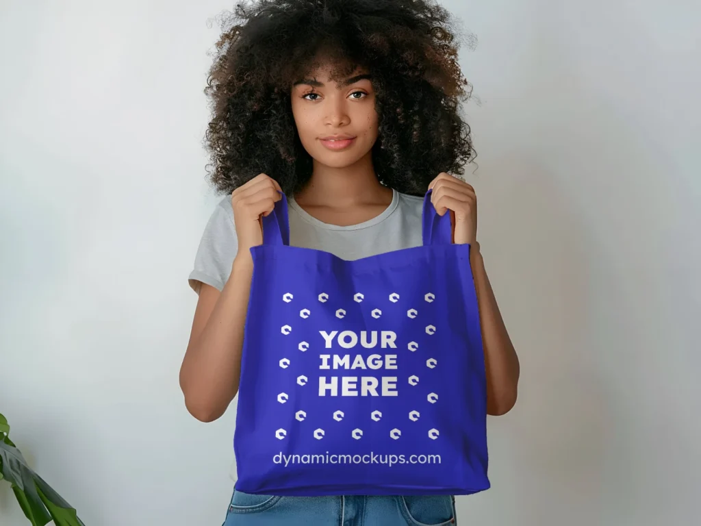 Woman Holding Blue Tote Bag Mockup Front View Template