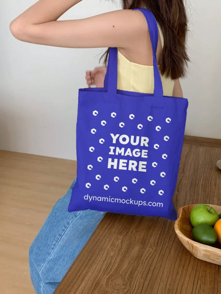 Woman Holding Blue Tote Bag Mockup Side View Template