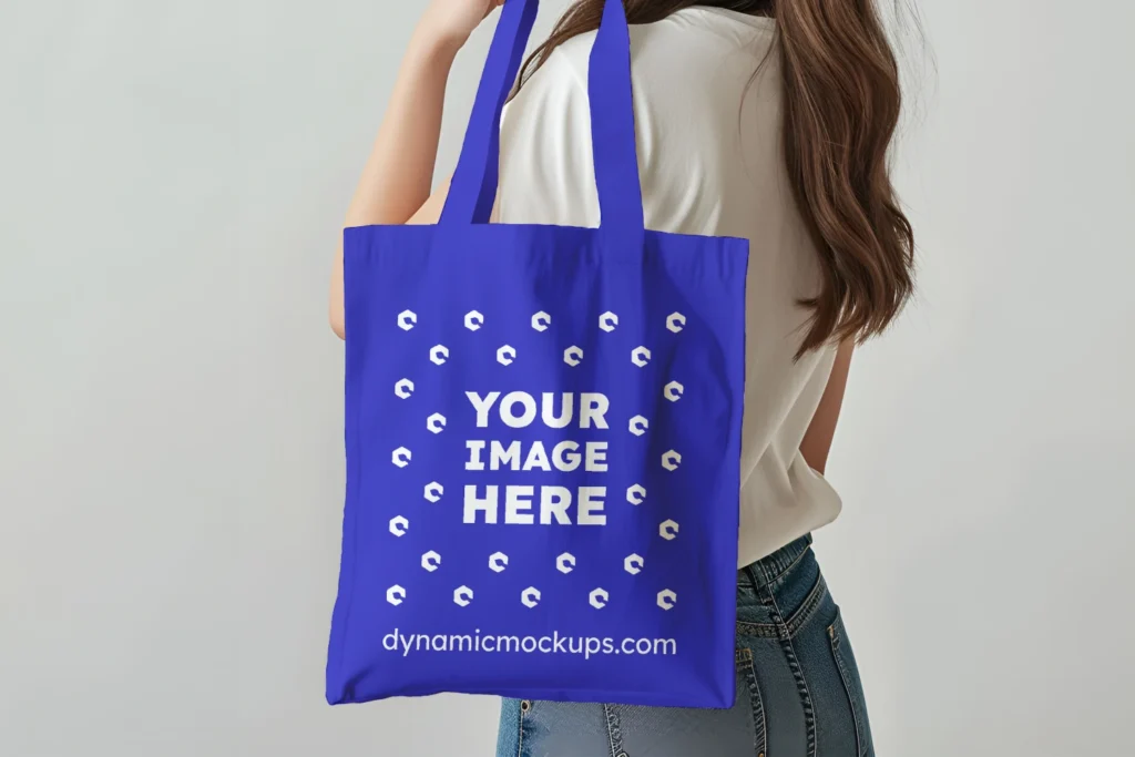 Woman Holding Blue Tote Bag Mockup Side View Template