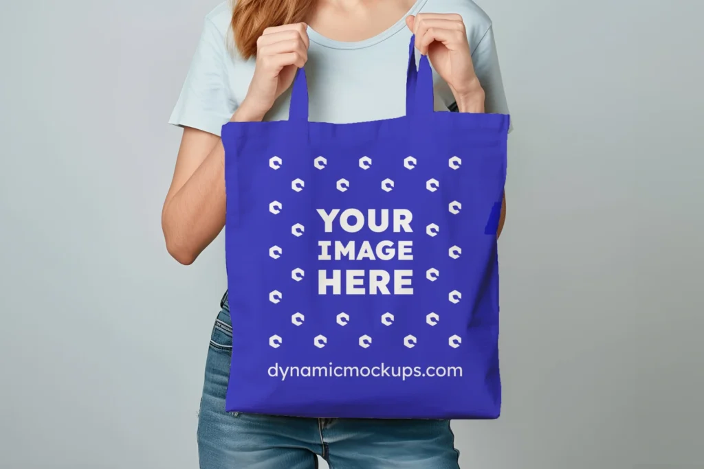 Woman Holding Blue Tote Bag Mockup Front View Template